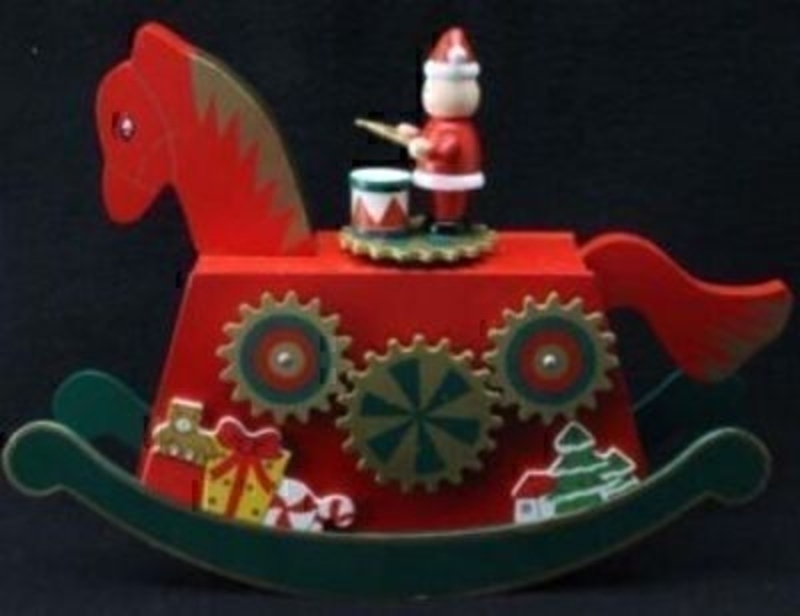 This wooden rocking horse has a very traditional appearance reminding you of past Christmases spent next to the fire. The horse features a small Santa music box also with the Traditional Christmas Decoration style. It is a beautiful piece that will be enjoyed year after year typical of Gisela Graham Christmas Decorations.  Plays Silent Night. Size 24x18x6cm<br><br>
If it is Christmas Decorations to be sent anywhere in the UK you are after than look no further than Booker Flowers and Gifts Liverpool UK. Our Christmas Decorations are specially selected from across a range of suppliers. This way we can bring you the very best of what is available in Christmas Decorations.<br><br>
Gisela loves Christmas Gisela Graham Limited is one of Europes leading giftware design companies. Gisela made her name designing exquisite Christmas and Easter decorations. However she has now turned her creative design skills to designing pretty things for your kitchen, home and garden. She has a massive range of over 4500 products of which Gisela is personally involved in the design and selection of. In their own words Gisela Graham Limited are about marking special occasions and celebrations. Such as Christmas, Easter, Halloween, birthday, Mothers Day, Fathers Day, Valentines Day, Weddings Christenings, Parties, New Babies. All those occasions which make life special are beautifully celebrated by Gisela Graham Limited.<br><br>
Christmas and it is her love of this occasion which made her company Gisela Graham Limited come to fruition. Every year she introduces completely new Christmas Collections with Unique Christmas decorations. Gisela Grahams Christmas ranges appeal to all ages and pockets.<br><br>
Gisela Graham Christmas Decorations are second not none a really large collection of very beautiful items she is especially famous for her Fairies and Nativity. If it is really beautiful and charming Christmas Decorations you are looking for think no further than Gisela Graham.<br><br>
This This Rocking Horse music box by Gisela Graham is a really beautiful Christmas Decoration that will be enjoyed year after year. It is sure to delight and will fit in well with many Christmas themes and decorations especially a Traditional Christmas theme. Coming out year after year it will bring a smile to your face and bringing Christmas cheer and festive spirit to the house. For Gisela Graham Christmas Decorations sent anywhere in the UK remember Booker Flowers and Gifts in Liverpool UK
